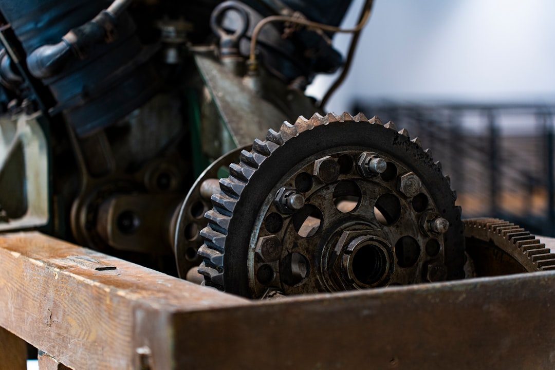 Engine gears are displayed inside of a box.