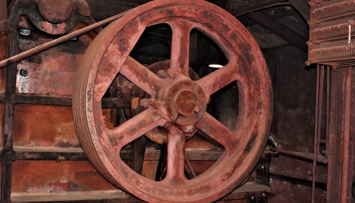 a close up of a large wheel on a machine